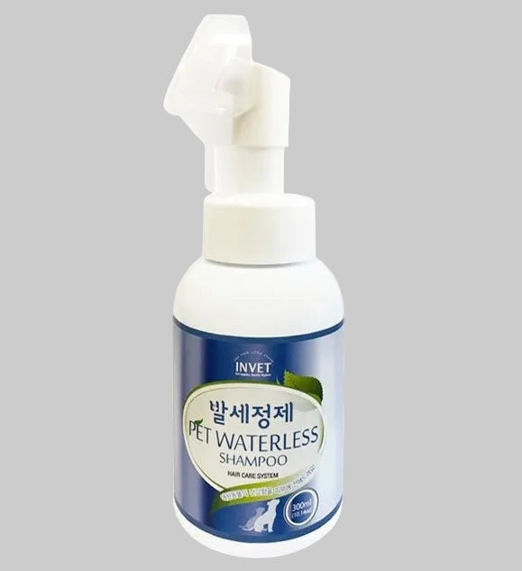 A bottle of INVET brand pet waterless shampoo, 300ml, with a pump dispenser.