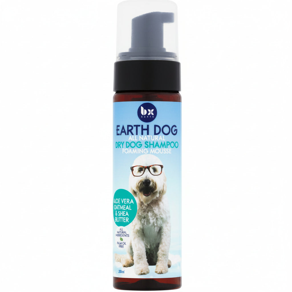 A bottle of BX Earth Dog Natural Dry Dog Shampoo with a pump dispenser